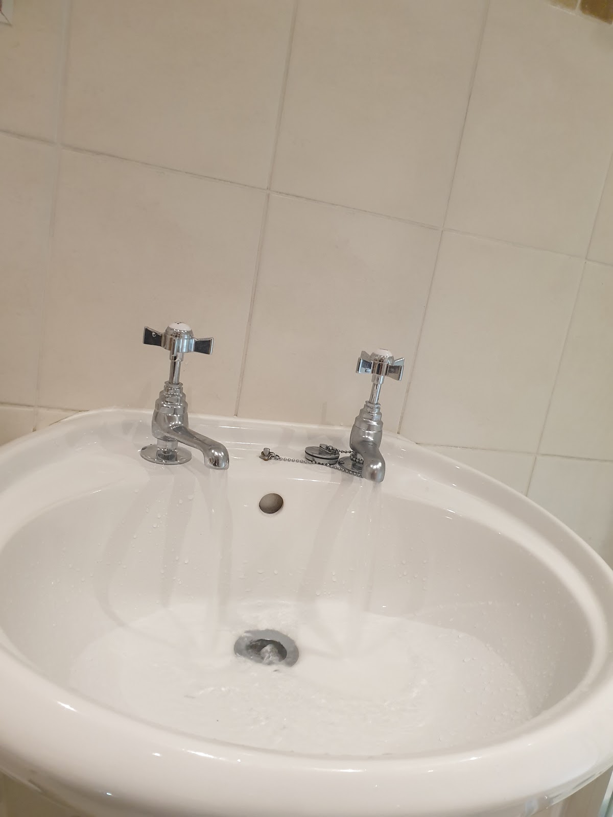 Chrome basin taps running after a plumbing repair